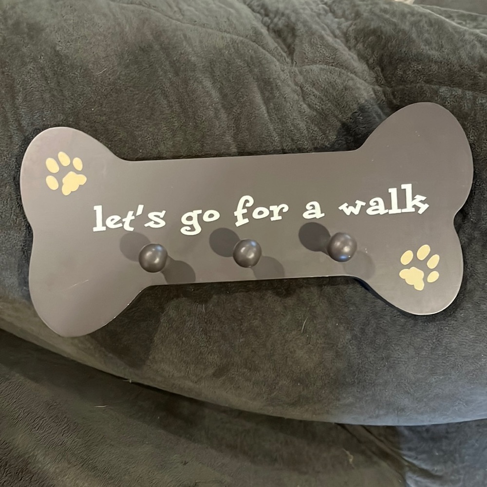 Dog leash holder.